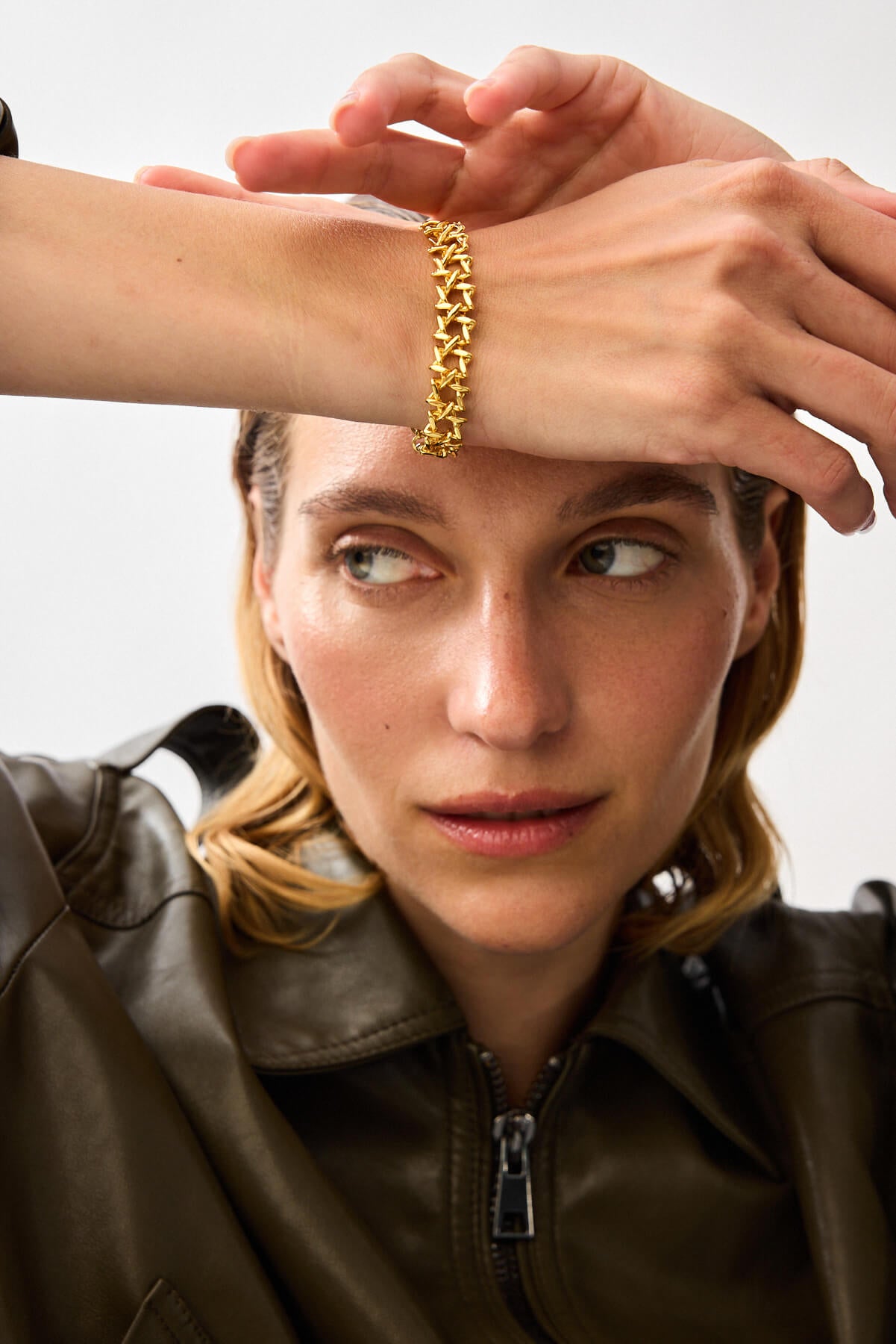 Model wearing the polished gold SOD Bracelet, Star Of David Motif Bracelet